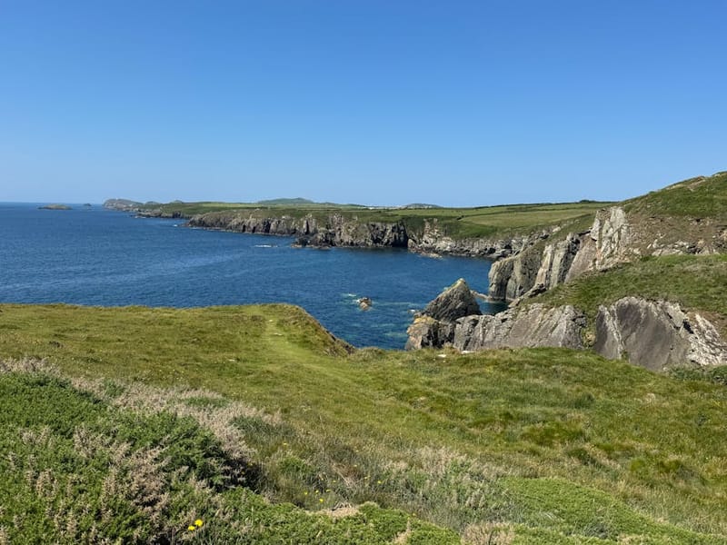Breathtaking coastal landscape of St Davids, Wales with cliffs and the Atlantic Ocean.