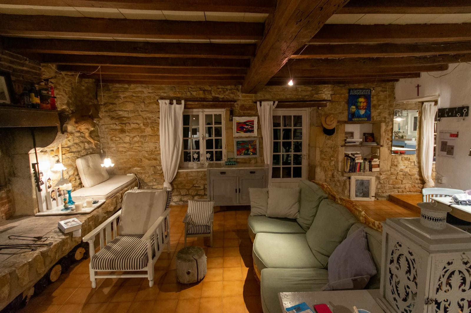 Dog relaxing on a sofa inside a UK countryside holiday cottage