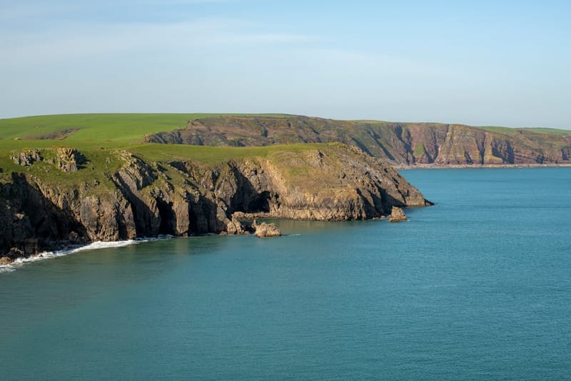 Stunning coastal cliffs and azure sea at Pembrokeshire, Wales. Perfect for travel and nature lovers.
